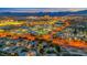 Scenic aerial panorama captures city lights, buildings, and mountains in the distance at 801 Sir James Bridge Way, Las Vegas, NV 89145