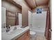 This bathroom features a single sink vanity with a shower and bath at 801 Sir James Bridge Way, Las Vegas, NV 89145