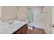 Bathroom featuring a modern vanity, toilet, and shower-tub combination with neutral tones at 8112 Mustang Hill Ct, Las Vegas, NV 89131