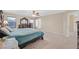 Spacious carpeted main bedroom showcasing neutral walls, and natural light streaming through the windows at 8112 Mustang Hill Ct, Las Vegas, NV 89131