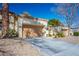 Well-maintained single story property with a two-car garage and low maintenance landscaping at 8916 Evening Star Dr, Las Vegas, NV 89134