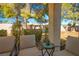 Charming outdoor patio with comfortable seating and serene garden views at 8916 Evening Star Dr, Las Vegas, NV 89134