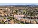 An aerial view of a home in a desert community that features mature trees and landscaping at 941 Armandito Dr, Las Vegas, NV 89138