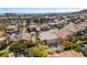 Aerial view of property showing a sparkling pool and manicured landscaping at 941 Armandito Dr, Las Vegas, NV 89138