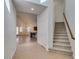 Open concept entryway and staircase leading to the home's second level at 941 Armandito Dr, Las Vegas, NV 89138