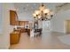 Spacious kitchen with stainless steel appliances, a big kitchen island, and pendant lighting at 941 Armandito Dr, Las Vegas, NV 89138