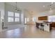 An open-concept living room features tile floors, a fireplace, large windows, and abundant natural light at 941 Armandito Dr, Las Vegas, NV 89138