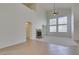 Bright living room with fireplace, soaring ceilings, and lots of natural light at 941 Armandito Dr, Las Vegas, NV 89138