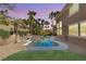 Inviting backyard pool featuring mature landscaping and serene privacy for relaxation at 941 Armandito Dr, Las Vegas, NV 89138