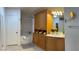 Bathroom with built-in storage shelves and drawers above and below the sink area and a shower tub at , Las Vegas, NV 89118