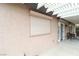 Covered patio features exterior shades and a seating area, perfect for relaxing outdoors at , Las Vegas, NV 89118