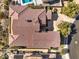 Aerial view of a terracotta tile roof showcasing the home's unique architectural design and landscape at 1 Ibis Ct, Henderson, NV 89052