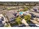 A sprawling property features a private pool, manicured landscaping, and a nearby golf course at 1 Ibis Ct, Henderson, NV 89052
