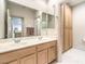 Bathroom features double sinks, neutral cabinets and flooring, and ample storage space at 1 Ibis Ct, Henderson, NV 89052