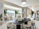 Bright dining room boasts neutral tones and a large window with great outdoor views at 1 Ibis Ct, Henderson, NV 89052