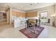 View of kitchen with breakfast bar open to the dining area, showcasing the home's open floor plan at 1 Ibis Ct, Henderson, NV 89052