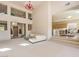 Open floor plan features a comfortable living space connected to the dining area at 1 Ibis Ct, Henderson, NV 89052