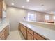 Living room with a bar area, sink, mini fridge, and seating at 1 Ibis Ct, Henderson, NV 89052