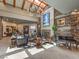 Elegant lobby area with stone accents, fireplace, and seating at 1 Ibis Ct, Henderson, NV 89052