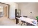 Clean office featuring modern desk and stainless steel fridge at 1 Ibis Ct, Henderson, NV 89052