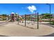 Community playground with swings and climbing structures at 1 Ibis Ct, Henderson, NV 89052