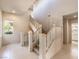 Bright staircase featuring natural lighting and light colored wood at 1 Ibis Ct, Henderson, NV 89052