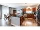 Bright open floorplan that connects kitchen, dining area, and living room; perfect for entertaining guests at 10745 Leatherstocking Ave, Las Vegas, NV 89166