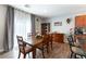 Open kitchen seamlessly integrates with the dining area, creating an inviting and functional space at 10745 Leatherstocking Ave, Las Vegas, NV 89166