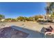Community basketball court featuring well maintained court, trees, seating and landscaping at 11103 African Sunset St, Henderson, NV 89052
