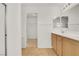 Bathroom with tile floor, closet, double sinks, and large mirrors at 11103 African Sunset St, Henderson, NV 89052