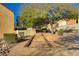 Bocce ball court, surrounded by desert landscaping, near walking path and community greenery at 11103 African Sunset St, Henderson, NV 89052