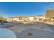 Park area in the community with mature landscaping, benches, pathways, and nearby homes at 11103 African Sunset St, Henderson, NV 89052