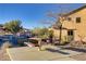 Community picnic area offering a great spot for gatherings with trees and walkways on a bright sunny day at 11103 African Sunset St, Henderson, NV 89052