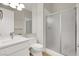 Clean bathroom design with glass-enclosed shower, modern sink, and a neutral color scheme at 11354 Merado Peak Dr, Las Vegas, NV 89135