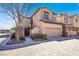 Charming two-story home with neutral stucco and a large garage at 11354 Merado Peak Dr, Las Vegas, NV 89135