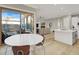 Cozy breakfast nook connected to the kitchen, seamlessly flowing into the bright and airy living area at 11354 Merado Peak Dr, Las Vegas, NV 89135