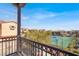 Balcony view overlooking the community tennis courts and lush landscaping at 11354 Merado Peak Dr, Las Vegas, NV 89135