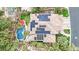 Bird's-eye view of a home with solar panels and a private backyard pool at 116 N Ring Dove Dr, Las Vegas, NV 89144