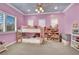 Whimsical bedroom featuring a bunk bed and plenty of storage and natural light at 116 N Ring Dove Dr, Las Vegas, NV 89144