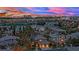 Night view of the city skyline from an elevated neighborhood with luxury homes at 116 N Ring Dove Dr, Las Vegas, NV 89144