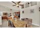 A wooden dining table with seating beneath a vaulted ceiling at 116 N Ring Dove Dr, Las Vegas, NV 89144