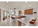 Open concept kitchen area, featuring seating at the island and ample counter space at 116 N Ring Dove Dr, Las Vegas, NV 89144