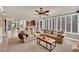 Spacious living room with fireplace and abundant natural light at 116 N Ring Dove Dr, Las Vegas, NV 89144