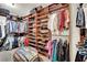 Large walk-in closet with built-in shelving and racks for ample storage at 116 N Ring Dove Dr, Las Vegas, NV 89144