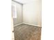 Neutral bedroom with carpeted floor, natural light, and window with blinds at 11703 Emerald Lake Ave, Las Vegas, NV 89138