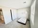 Bright bedroom featuring carpet flooring, natural light, and closet space at 11703 Emerald Lake Ave, Las Vegas, NV 89138