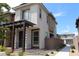Stylish two-story home showcasing a pergola covered entryway, low-maintenance landscaping, and modern architectural details at 11703 Emerald Lake Ave, Las Vegas, NV 89138