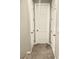 Upstairs hallway with multiple doors and neutral tones at 11703 Emerald Lake Ave, Las Vegas, NV 89138