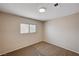 Cozy bedroom with neutral tones and a window allowing natural light at 1813 Pluto Dr, Las Vegas, NV 89108