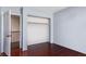 Bedroom with wood flooring and a closet, bathed in natural light at 1930 Silver Crest Ct, North Las Vegas, NV 89031